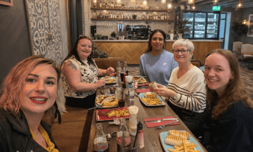 James Wilby team members sharing lunch for International Women's Day